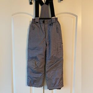 Ski bib pants.  So warm and the color matches so many coat colors.